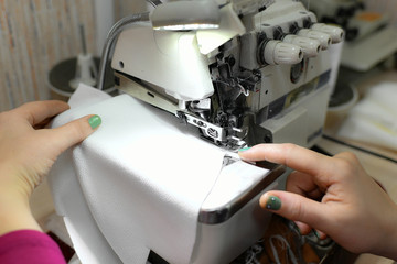 seamstress sewing workshop thread fabric