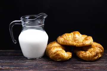 Milk in a glass jar on the floor
