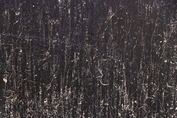 White color stain on black background