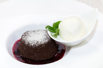 Dessert from a baking dish on tables in a restaurant is shot close-up
