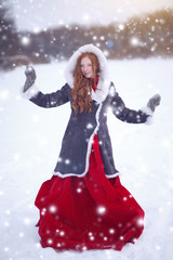 Fototapeta na wymiar Beautiful young woman. Fairy tale girl in sheepskin coat in magic forest. Copy space. Christmas
