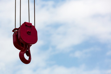 Work part with crane hook against the sky.
