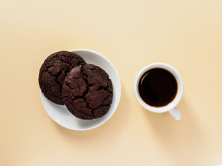 Black espresso in a white Cup. Chocolate chip cookies