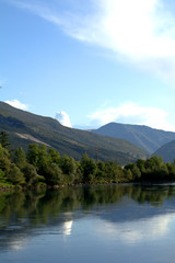 Fototapeta na wymiar river in the mountains,panorama,landscape,reflection,green,beautiful, scenic