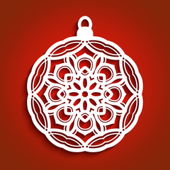 Christmas ornament on red background, cutout paper bauble with snowflake pattern, xmas lace decoration, template for laser cutting