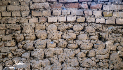 The texture of the wall of clay brick.