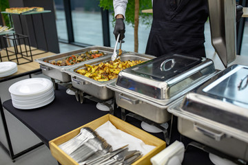 banquet table with chafing dish heaters At the restaurant