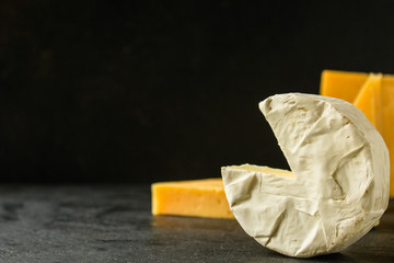 cheese, Assorted cheeses on one slate plate - tasting snacks. healthy food. copy space for text and lettering