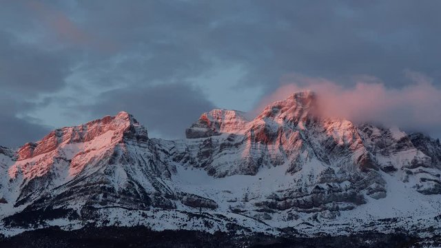 Sunrise Time Lapse rocky mountains after a heavy snowfall