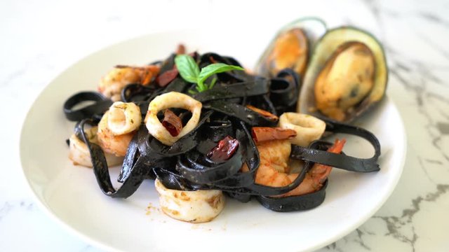 black spaghetti stir-fried garlic with seafood