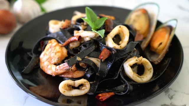 black spaghetti stir-fried garlic with seafood
