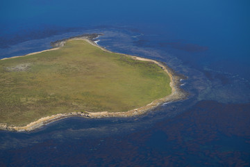 View from an aircraft flying over Bleaker Island in the Falkland Islands.  
