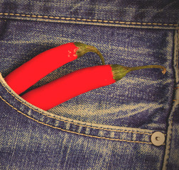 red peppers in a jeans pocket