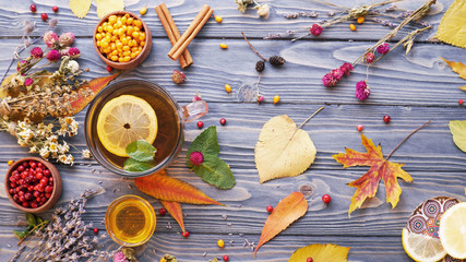 tea ingredients and dry herbs on a beautiful wooden table