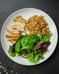 healthy salad, quinoa, chicken meat (buddha bowl, lettuce, mix, vitamins) menu concept. food background. copy space. Top view