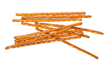 Bread sticks straws with salt on a white background. Salty snacks.
