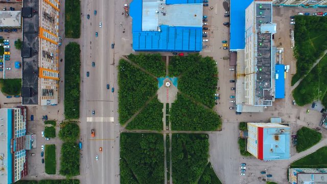 Vorkuta city, Russia with colorful buildings, a central highway and an alley passing in the park from a bird's eye view. Copter ( drone ) shooting
