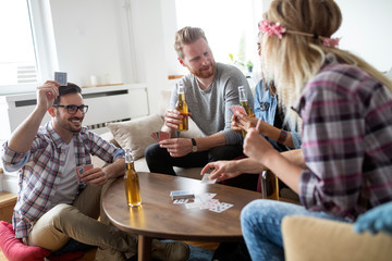 Young happy couple doing the ironing together