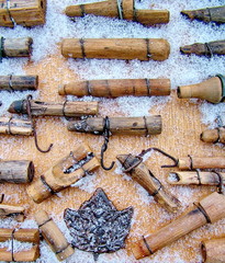 Homemade carved wooden spiles used to tap maple trees, for sap, for making maple syrup in Canada.