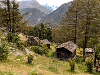 Fototapeta na wymiar Traditional Alpine wooden houses in the Swiss Alps.