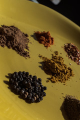 spices on yellow background