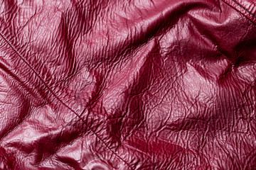 Close-up of a red leather texture background.