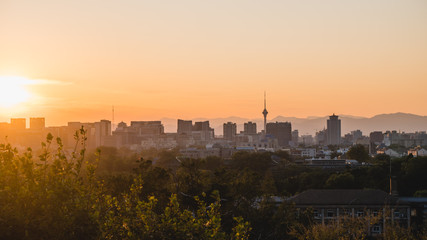 Panoramic view of Beijing from a viewpoint at sunset, on a clear day