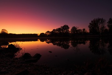 Sunrise on a winter lake 