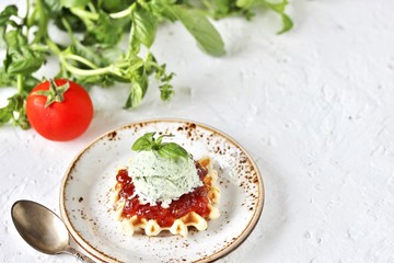 tomato jam with ice cream from basil on waffle gourmet food. restaurant serve. unusual dessert gourmet