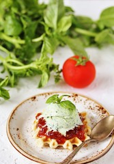 tomato jam with ice cream from basil on waffle gourmet food. restaurant serve. unusual dessert gourmet