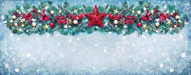 Christmas background with fir branches and holiday decoration