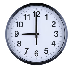 Wall clock isolated on white background. Nine oclock