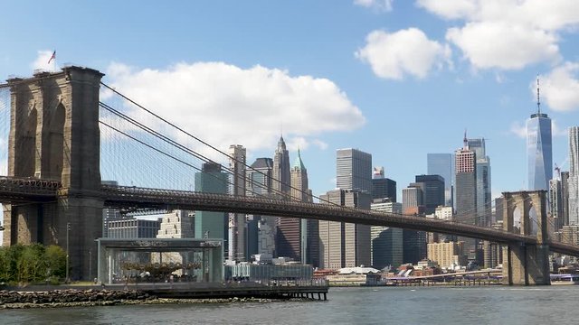 Panning Right & scanning Lower Manhattan Skyline and East River + Brooklyn Bridge