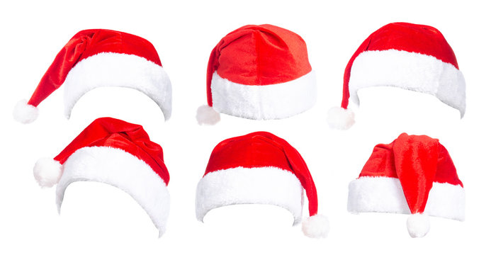 Set of red Santa Claus hats on white background isolation