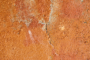 White and golden messy wall stucco texture background.