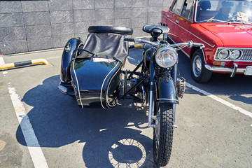 retro motorcycle at an auto show.