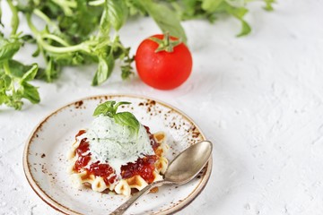 tomato jam with basil ice cream on waffle gourmet food. restaurant serve. unusual dessert gourmet