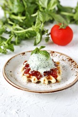 tomato jam with basil ice cream on waffle gourmet food. restaurant serve. unusual dessert gourmet