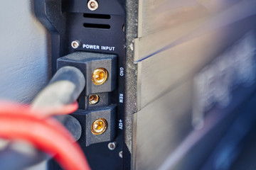 close-up of car power amplifier at auto sound show