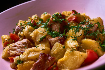 Grilled potatoes with roasted pork meat