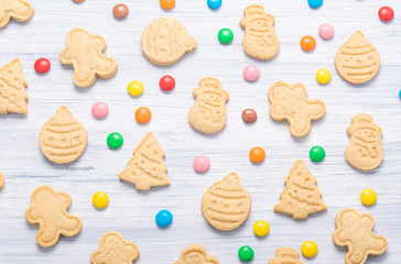 Christmas cookies lies in multi-colored chocolate tablets, a beautiful top view