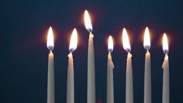 Video Of Six Lit Hanukkah Candles ON GRUNGE BACKGROUND And Shamash