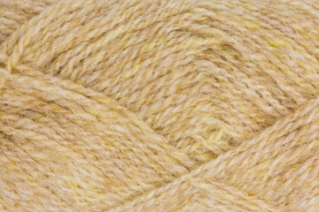 background of ball of shetland wool in light brown