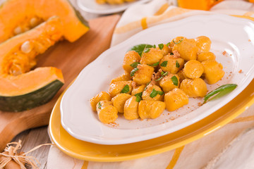 Pumpkin gnocchi with grated amaretti cookies.