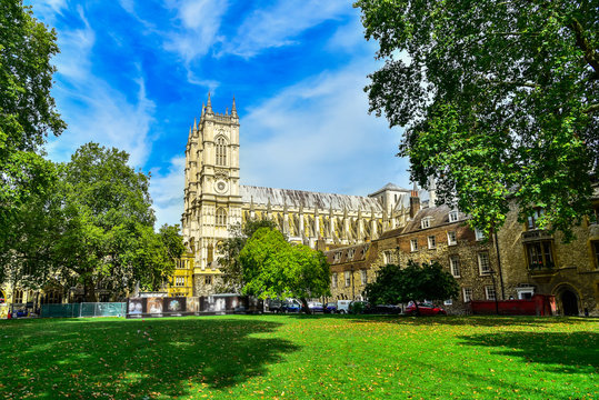 Westminster Abbey seen from a green park in London, England