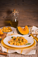 Pumpkin gnocchi with grated amaretti cookies.