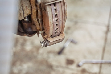 Car brake replacing new caliper pin. car repair, suspension parts, garage repair. car brake system.