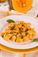 Pumpkin gnocchi with grated amaretti cookies.