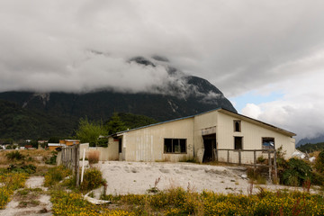 Fototapeta na wymiar Destroyed and abandoned buildings after Chaitén volcano eruption in 2008 in Chaitén city, Los Lagos Region, Patagonia, Chile
