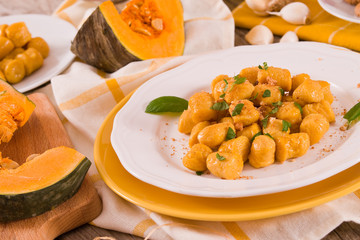 Pumpkin gnocchi with grated amaretti cookies.